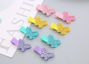 Détails de barrettes papillon en strass colorés pour filles dans quatre tons pastels