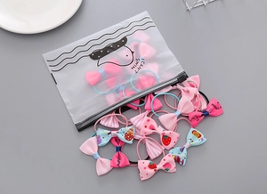 50-piece set of girls' elastic hair ties with cute floral bows in frosted packaging