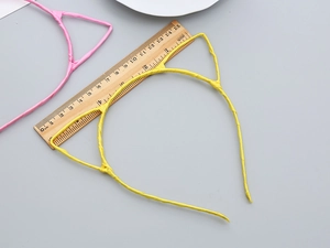 Detail view of yellow cat ear headband with ruler showing 12.5cm width and 4.5cm ear height