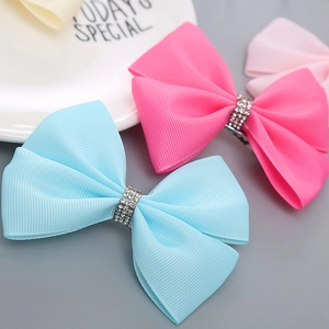 Handgefertigte Prinzessin Haarklammern mit Schleifen und Strasssteinen in Pink und Blau