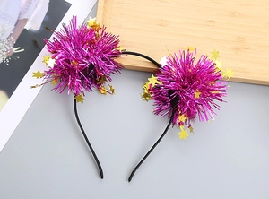 Close-up of purple tinsel party headband with gold star sequins and black plastic base