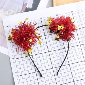 Sparkly red pom pom headband with gold stars for festive party hair accessories