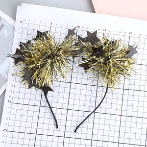 Sparkly gold and black star headband for festive children party hair accessories