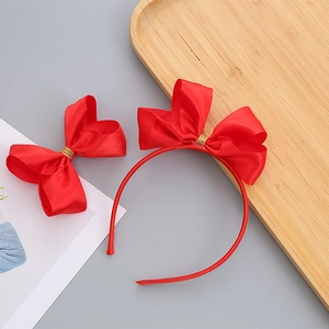 Set cerchietto e molletta con fiocco in raso rosso per bambina stile festivo