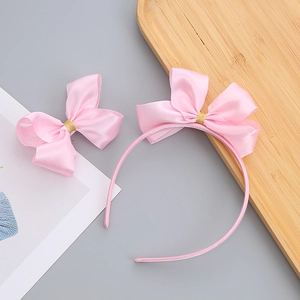 Set cerchietto e molletta con fiocco in raso rosa per bambine con dettagli glitter