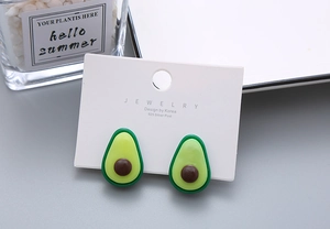 Detail of cute avocado fruit clip-on earrings with 925 silver post for kids