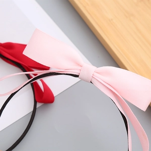 Girl's cute pink ribbon headband with high-quality handmade textured fabric bow accessory