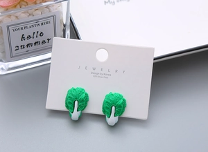 Close-up of cute Chinese cabbage resin earrings with 925 silver needles on display