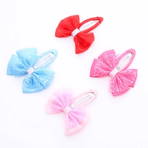 Set of four lace and ribbon bow hair clips for girls in red, blue, rose and pink