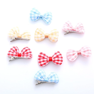 Set di 7 fermagli per capelli a fiocco per bambine in tessuto a quadri colori pastello