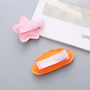 Sparkly sequin star and cloud hair clips with pink ribbon wrapped alligator base