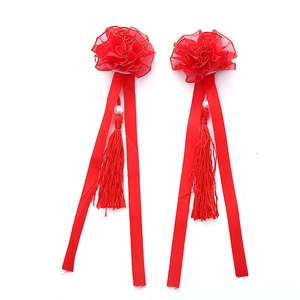 Pair of red Chinese floral hair clips with long tassels and beads for girls' traditional dress