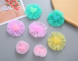 Set of seven macaron colored mesh flower hair clips with heart and Sweet resin charms