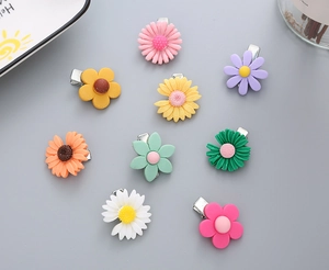 Detailed view of 8 matte resin flower hair clips in vibrant candy colors for children