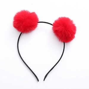 Cute red pompom headband for girls with fluffy plush balls on a black frame