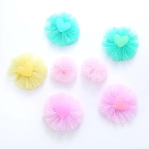 Charming girl's mesh flower hair clips with heart accents in mint, yellow, and pink colors