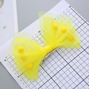 Barrette à cheveux jaune en tulle avec pompons pour les spectacles festifs des enfants