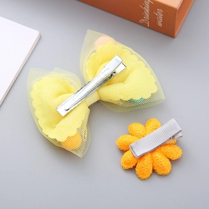 Süßes 2er-Set mit gelber Tüllschleife und orangefarbener Strickblume für Mädchen