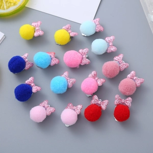 Sparkly glitter bow hair clips with colorful pom poms and metal clips for kids