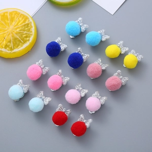 Cute kids hair clips set with colorful pom-poms and shiny silver sequin bows
