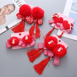 Set di fermagli per capelli rossi per bambine con nappe, pompon e motivi a coniglietto