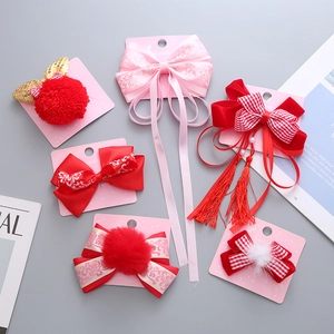 Set mollette per capelli stile cinese con fiocchi rossi e nappe per Capodanno bimbi