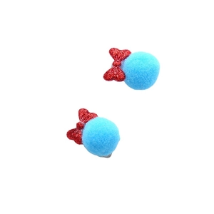 Sparkly blue fur ball hair clips with red glitter bows for kids and girls