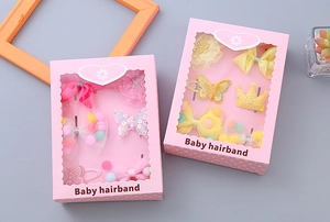 Detail view of 6-piece children's hair accessory gift boxes with bows and sequins