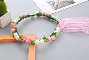 Detailed view of pink and white PE foam flower crown with silk ribbons for girls