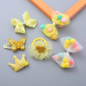 6-piece yellow kids hair accessories gift set with handmade bows and sequin clips