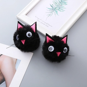 Set of two fluffy black cat plush hair accessories with pink ears for Halloween party