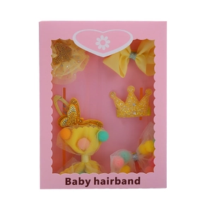 Yellow baby hair accessories gift set with bows and crown clips in a pink box