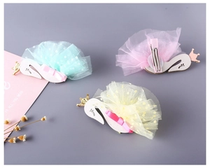 Set of swan hair clips for girls with tulle ballet skirts and golden glitter crowns