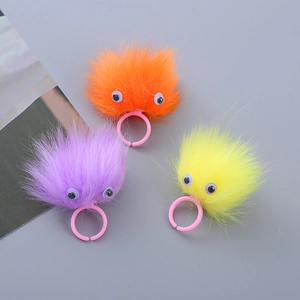 Set of 3 colorful plush monster rings for kids with googly eyes and adjustable bands