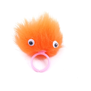 Funny orange plush monster ring for kids featuring fuzzy texture and large cartoon eyes