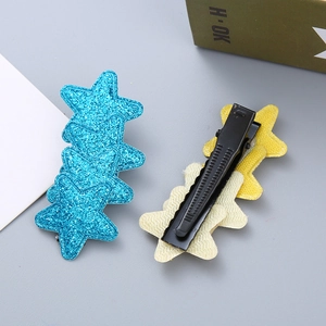 6-pack glitter star hair clips for girls featuring sparkling blue and yellow pentagram shapes