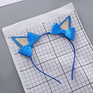Cerchietto con orecchie da gatto in paillettes blu con fiocco e scala di misura in cm