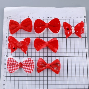 7-piece festive red velvet and plush bow hair clips set with pearls and rhinestones