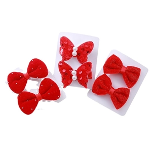 Red velvet girls bow hair clips set with sparkling rhinestones and pearls for New Year