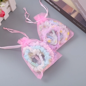 Organza Haargummis Set mit Gänseblümchen-Druck in rosa Geschenktüte für Mädchen