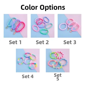 Detailed close-up of acrylic beaded bracelets with seahorse and flower charms for girls