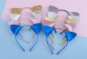 Détail de serre-têtes oreilles de chat à paillettes en plusieurs couleurs pour fête