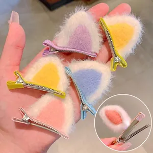 Cute plush cat ear hair clips for girls featuring colorful faux fur and metal duckbill clips
