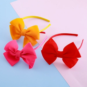 Three-piece large bow headband set for girls in vibrant orange, pink, and red colors