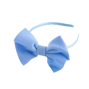 Light blue oversized bow headband for girls featuring elegant satin fabric styling