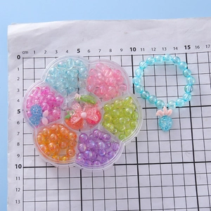 DIY jewelry making kit for girls with colorful resin beads and strawberry charm bracelet