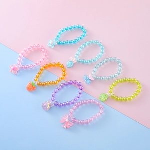 Kids DIY bracelet set with 8 colorful resin bead styles and cute glitter pendants