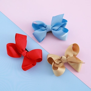 Three premium grosgrain ribbon bow hair clips in red, sky blue and golden brown