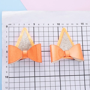 Barrettes à cheveux nœuds oreilles de chien orange pailleté pour filles sur grille