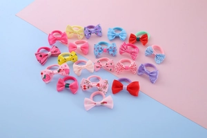 Detailed assortment of colorful macaron style ribbon bow hair ties for girls and children